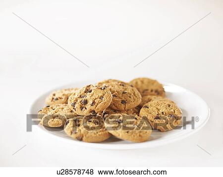 Stock Photo - Chocolate chip cookies on a plate. Fotosearch