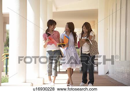 College students walking in corridor, Guam, USA View Large Photo Image Stock Photo - College students walking in corridor, Guam, USA. Fotosearch