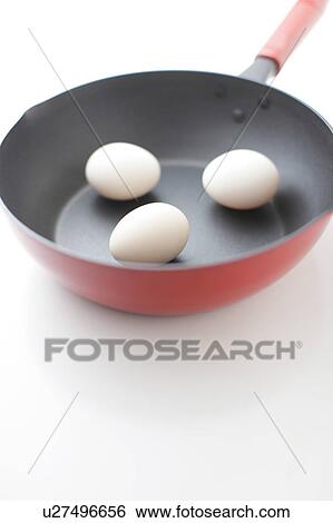 Eggs on Frying Pan View Large Photo Image Stock Photograph - Eggs on Frying Pan. Fotosearch