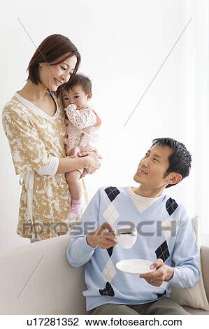 Stock Image - Family talking. Fotosearch