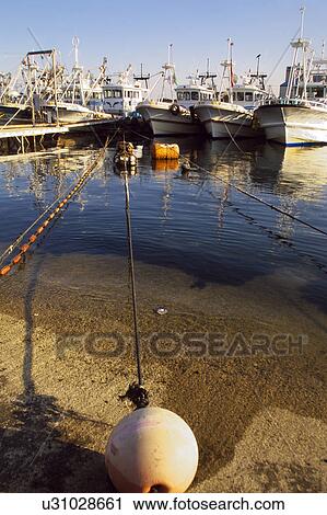 Stock Image - Fishing Boat at Nagata Harbor. Fotosearch