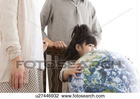 Girl holding beach ball View Large Photo Image Stock Image - Girl holding beach ball . Fotosearch