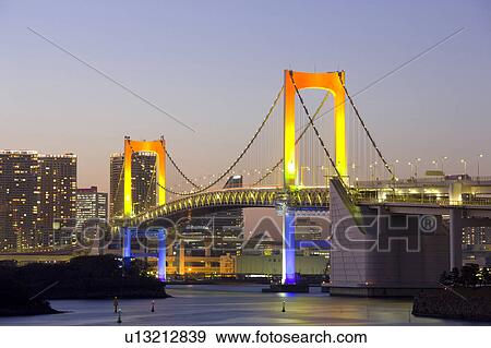 Stock Photo - Illuminated Rainbow Bridge. Fotosearch