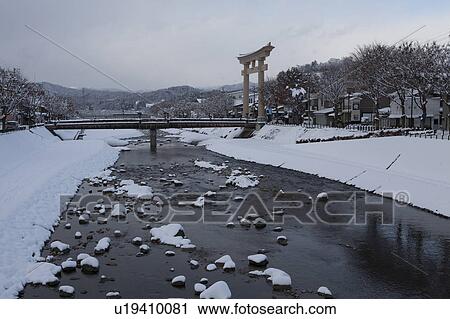 Stock Image - Miyagawriver and Torii of Sakurayama-Hachiman Shrine. Fotosearch