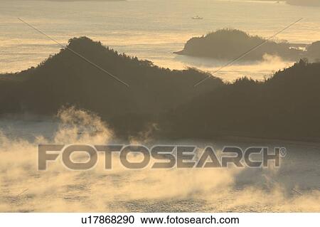 Stock Image - Morning Mist at Setonaikai. Fotosearch