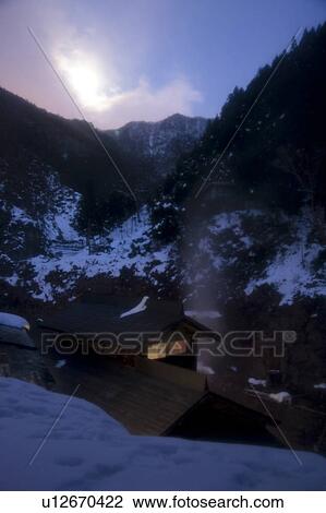 Stock Image - Mountain Village in Winter. Fotosearch