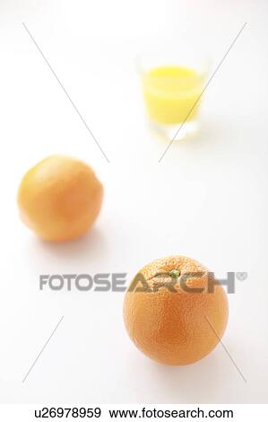 Oranges and orange juice View Large Photo Image Stock Photo - Oranges and orange juice. Fotosearch