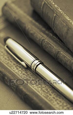 Stock Image - Pen and Harback Books. Fotosearch