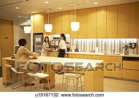 Stock Image - People talking at lounge. Fotosearch