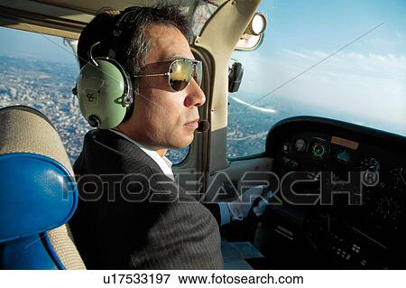 Stock Photo - Pilot Flying. Fotosearch