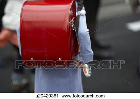 Stock Image - Portable security alarm on backpack. Fotosearch