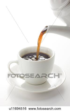 Pouring coffee in a cup View Large Photo Image Stock Photograph - Pouring coffee in a cup. Fotosearch