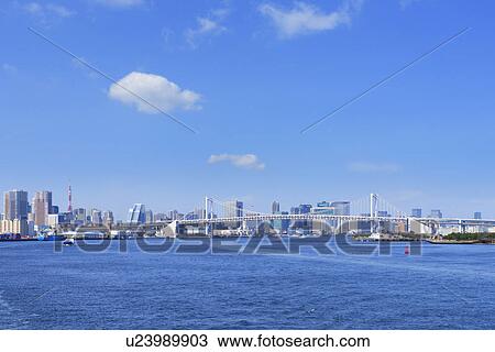 Stock Image - Rainbow Bridge, Shinagawa Ward, Koto Ward, Tokyo Prefecture, Honshu, Japan. Fotosearch