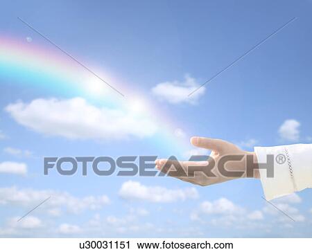Rainbow coming out of girl's hand, digital composite View Large Photo Image Stock Image - Rainbow coming out of girl's hand, digital composite. Fotosearch