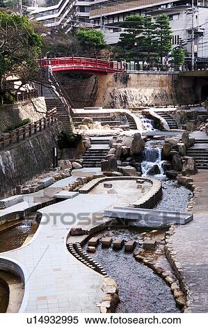 Stock Photography - Red Bridge and Stone Garden. Fotosearch