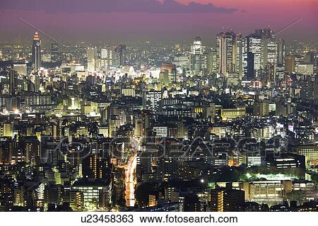 Stock Image - Shinjuku at Dusk. Fotosearch