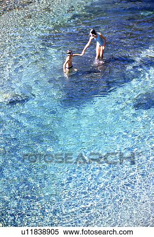 Sister and Brother Swimming View Large Photo Image Stock Photography - Sister and Brother Swimming. Fotosearch