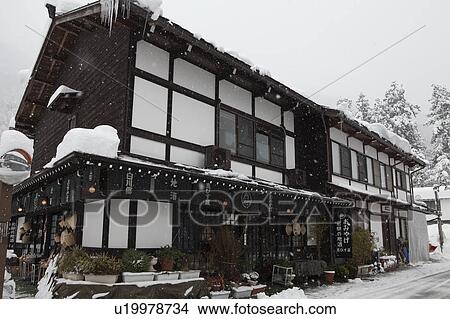 Picture - Snow-covered Souvenir Store at Shirakawa-go. Fotosearch
