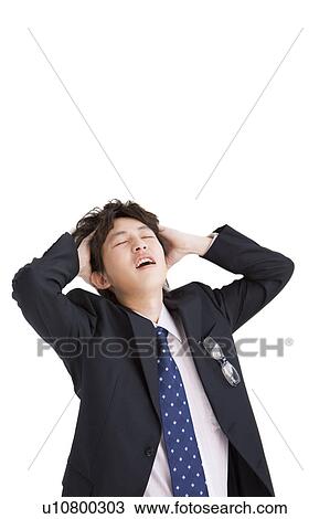 Stock Image - Stressed out businessman . Fotosearch