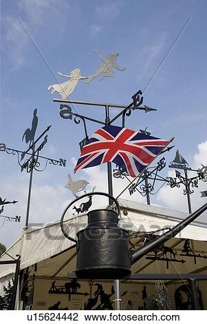 Stock Image - Weather Vane and British Flag. Fotosearch