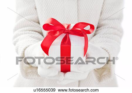 Stock Photo - Woman Holding Present. Fotosearch