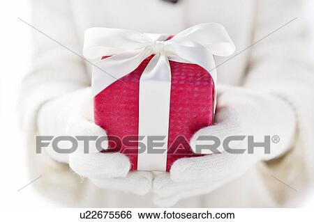 Woman Holding Present View Large Photo Image Stock Photograph - Woman Holding Present. Fotosearch