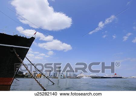 Stock Image - Yokohama Harbor and nautical vessels, Kanagawa Prefecture, Honshu, Japan. Fotosearch