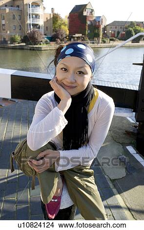 Young Woman by River View Large Photo Image Picture - Young Woman by River. Fotosearch