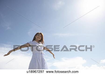 Young woman stretching, Guam, USA View Large Photo Image Stock Photo - Young woman stretching, Guam, USA. Fotosearch