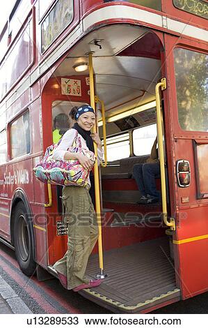 Young Woman Taking London Bus View Large Photo Image Stock Image - Young Woman Taking London Bus. Fotosearch