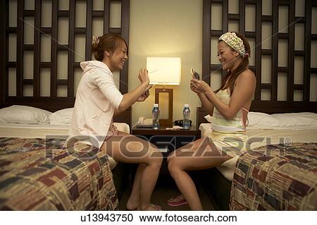 Young women playing cards View Large Photo Image Stock Image - Young women playing cards. Fotosearch