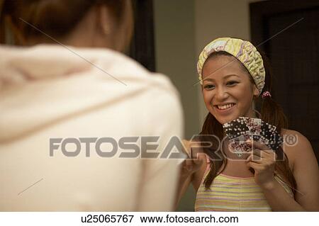 Young women playing cards View Large Photo Image Stock Photo - Young women playing cards. Fotosearch
