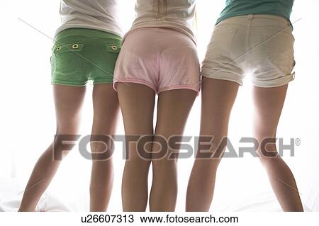 Young women's back shot View Large Photo Image Stock Image - Young women's back shot. Fotosearch