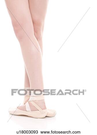 Stock Image - Ballet dancer's legs, studio shot. Fotosearch