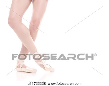 Stock Photo - Ballet dancer's legs, studio shot. Fotosearch