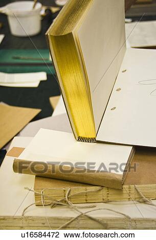 Stock Image - Book binding workshop. Fotosearch
