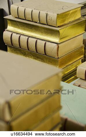 Books stacked in binding workshop View Large Photo Image Picture - Books stacked in binding workshop. Fotosearch