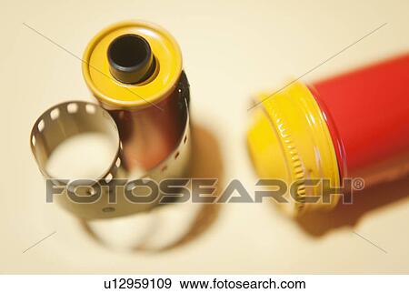 Camera film and film container, close-up View Large Photo Image Stock Photo - Camera film and film container, close-up. Fotosearch