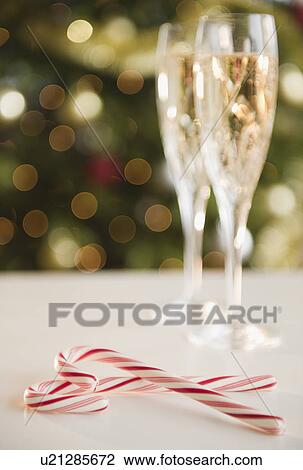 Christmas candy canes near champagne View Large Photo Image Stock Image - Christmas candy canes near champagne. Fotosearch