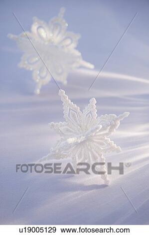 Stock Photo - Christmas snowflake ornaments. Fotosearch