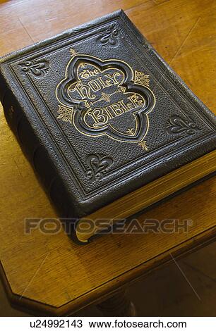 Stock Image - Close up of antique bible. Fotosearch