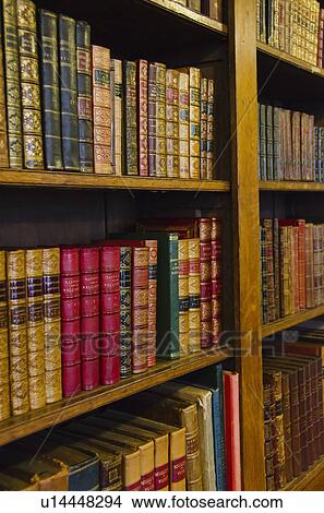 Close up of antique books on shelves View Large Photo Image Picture - Close up of antique books on shelves. Fotosearch
