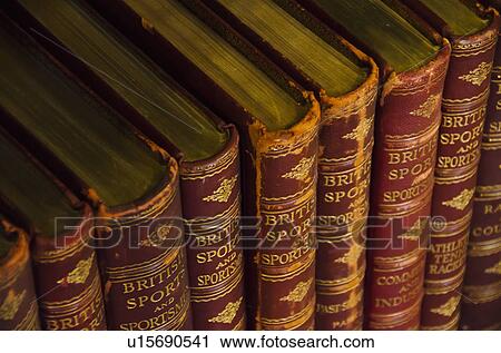 Close up of antique books on shelves View Large Photo Image Stock Image - Close up of antique books on shelves. Fotosearch