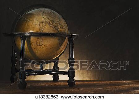 Close up of antique globe on table View Large Photo Image Stock Image - Close up of antique globe on table. Fotosearch