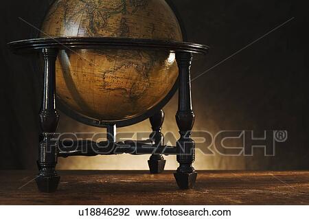 Close up of antique globe on table View Large Photo Image Stock Image - Close up of antique globe on table. Fotosearch