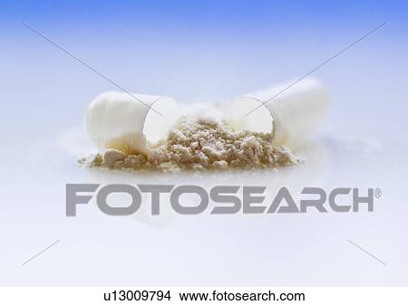 Close up of broken drug capsule View Large Photo Image Picture - Close up of broken drug capsule. Fotosearch