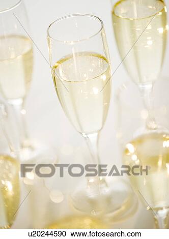 Close up of champagne flutes View Large Photo Image Stock Image - Close up of champagne flutes. Fotosearch