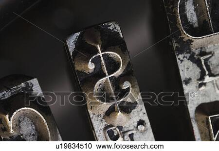 Stock Image - Close up of dollar sign on typewriter key. Fotosearch