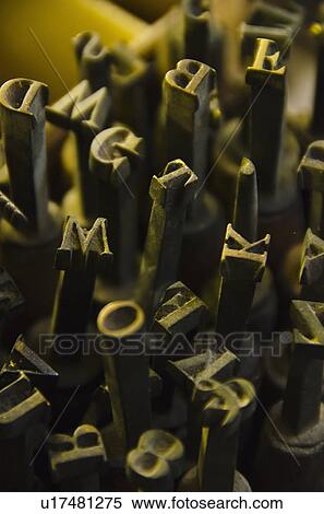 Stock Photography - Close up of fonts from antique book binding. Fotosearch