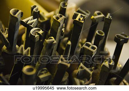 Stock Photography - Close up of fonts from antique book binding. Fotosearch